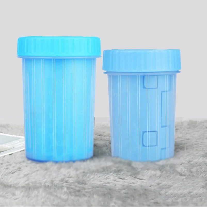 Two blue Pawvero pet cleaning cups with lids on grey textured surface