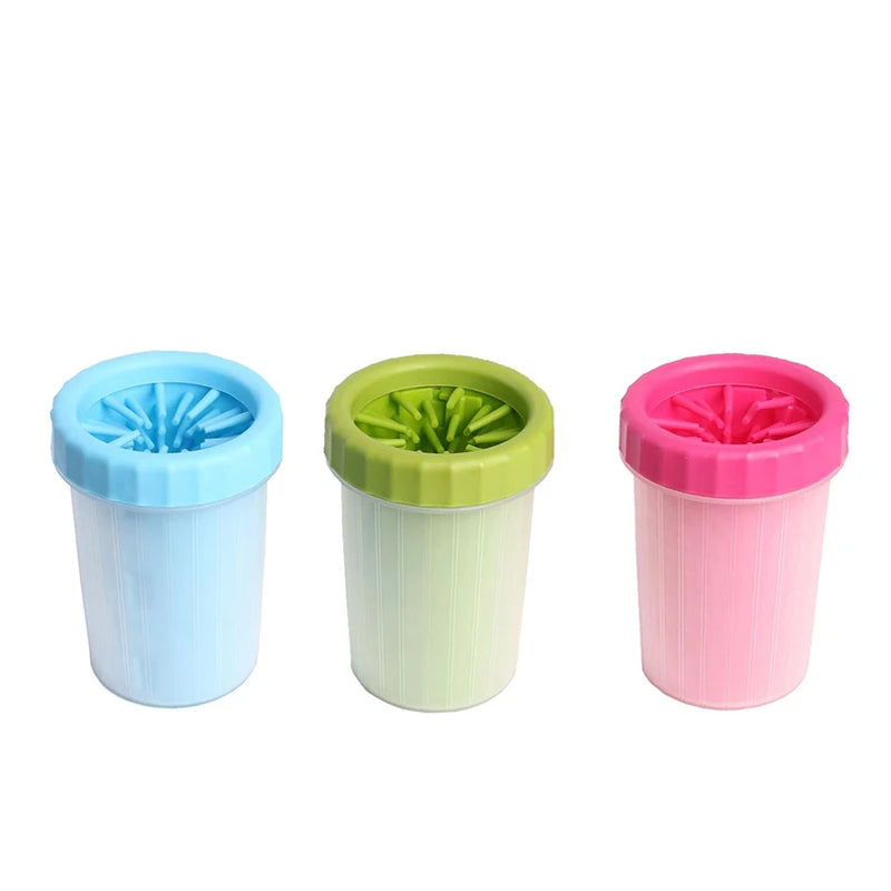 Colorful Pawvero dog paw cleaners in blue, green, and pink, lined up on a white background.